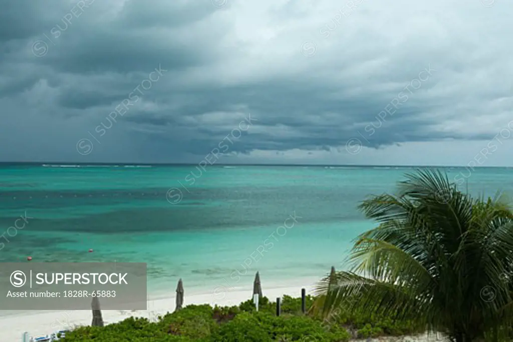 Thunderstorm Rolling in Over Coral Reef and Beach, Turks and Caicos