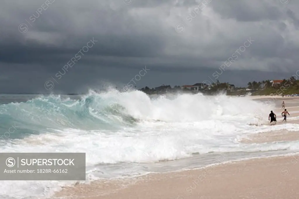 People Playing in Large Waves, Paradise Island, Bahamas