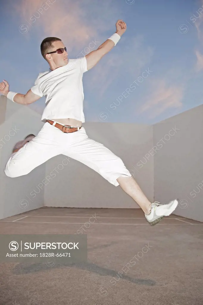 Man Jumping Up in the Air