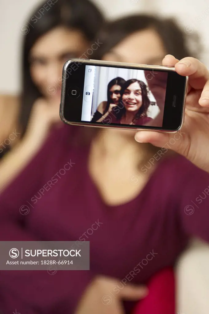 Woman Taking Photos with Phone Camera
