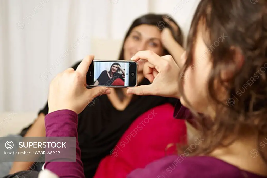 Woman Taking Photos with Phone Camera