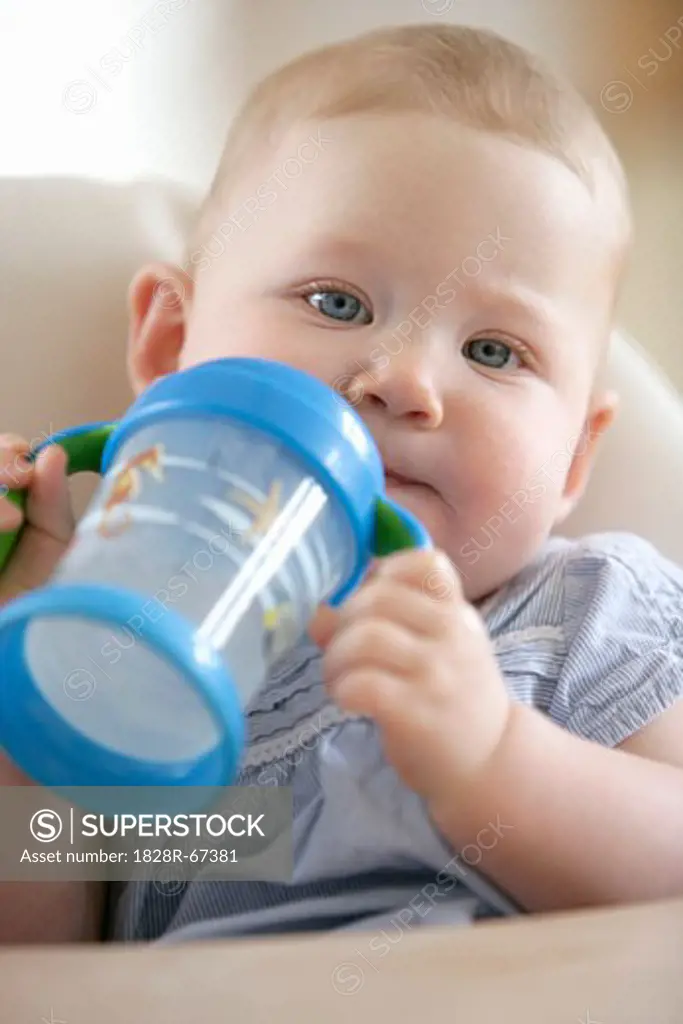 Baby Girl With Sippy Cup