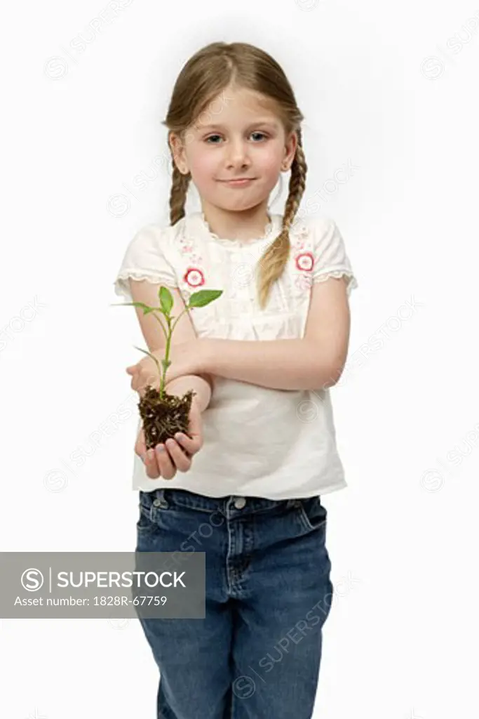 Girl Holding Sapling