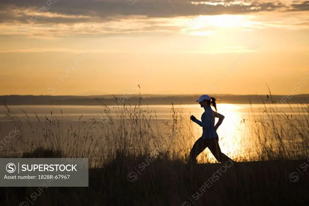 Woman Running near Puget Sound, Seattle, Washington, USA