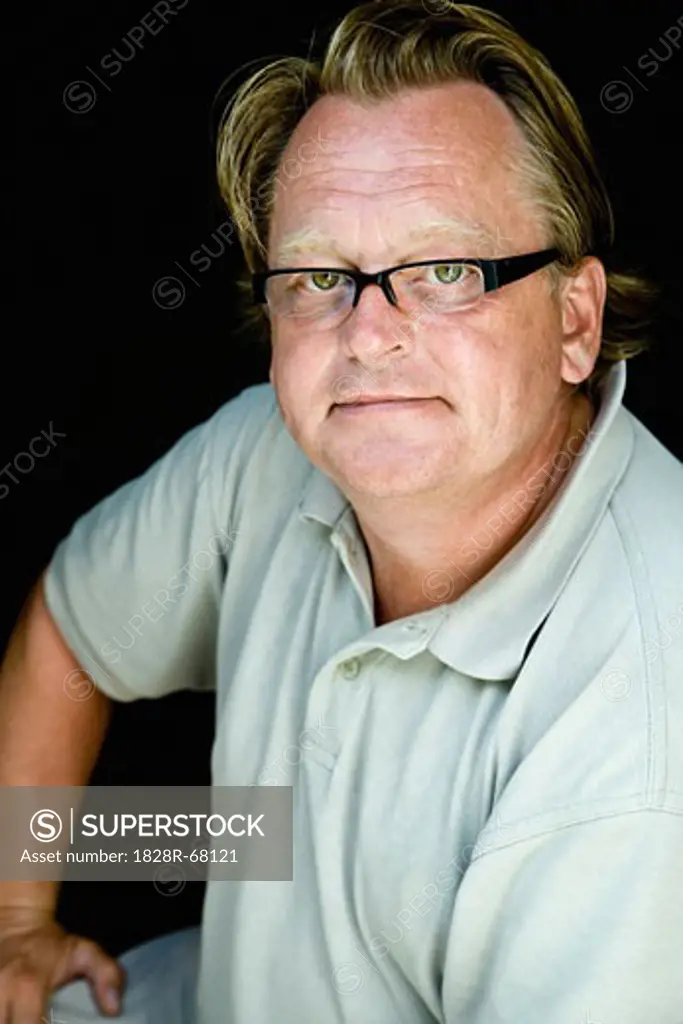 Portrait of Man Wearing Glasses