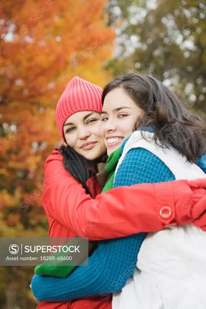 Women Hugging Outdoors