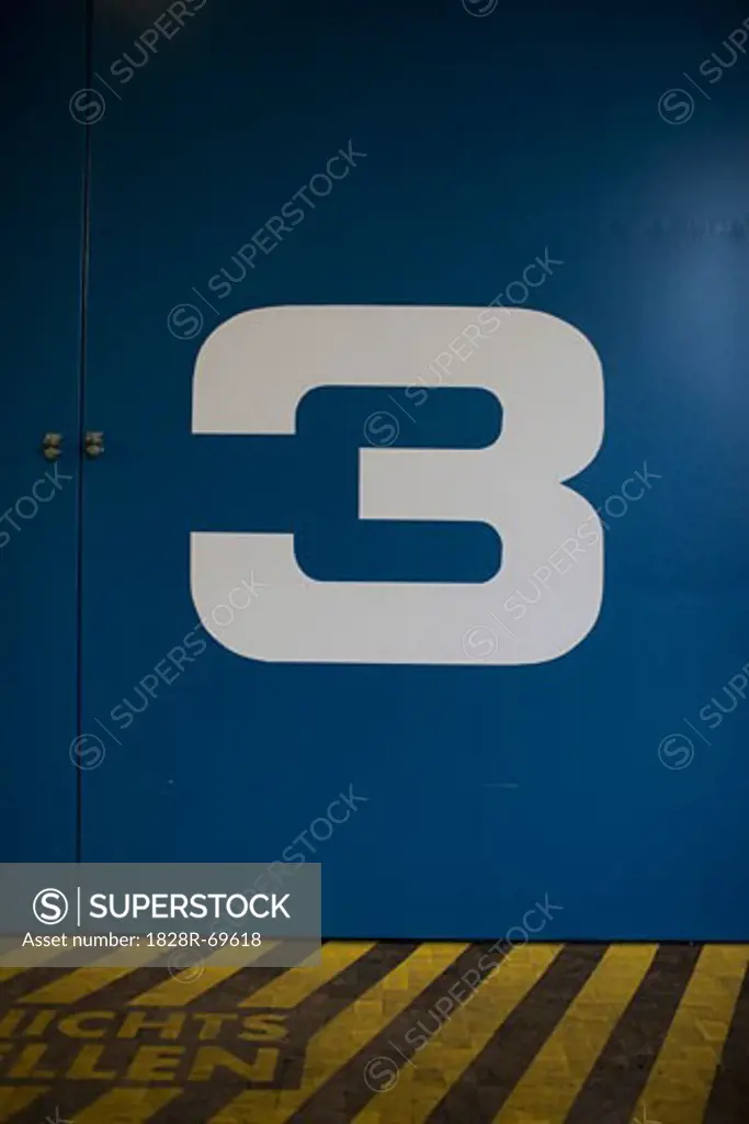 Close-up of the Number Three on a Door