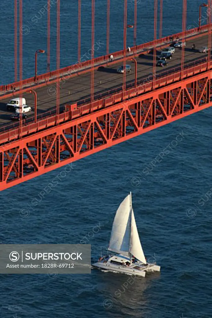Sailboat Passing Under the Golden Gate Bridge, San Francisco, California, USA