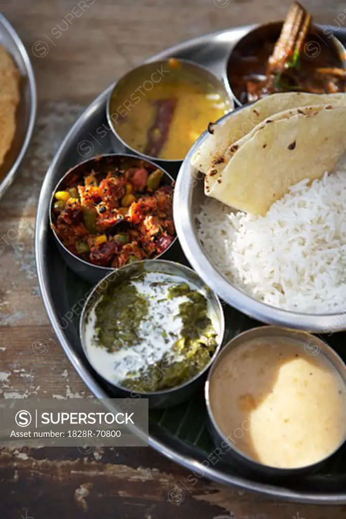 Thali, Kadai Bhindi, Mixed Vegetable Curry, Sambhar, Saag Paneer, Payasam, and Chapati