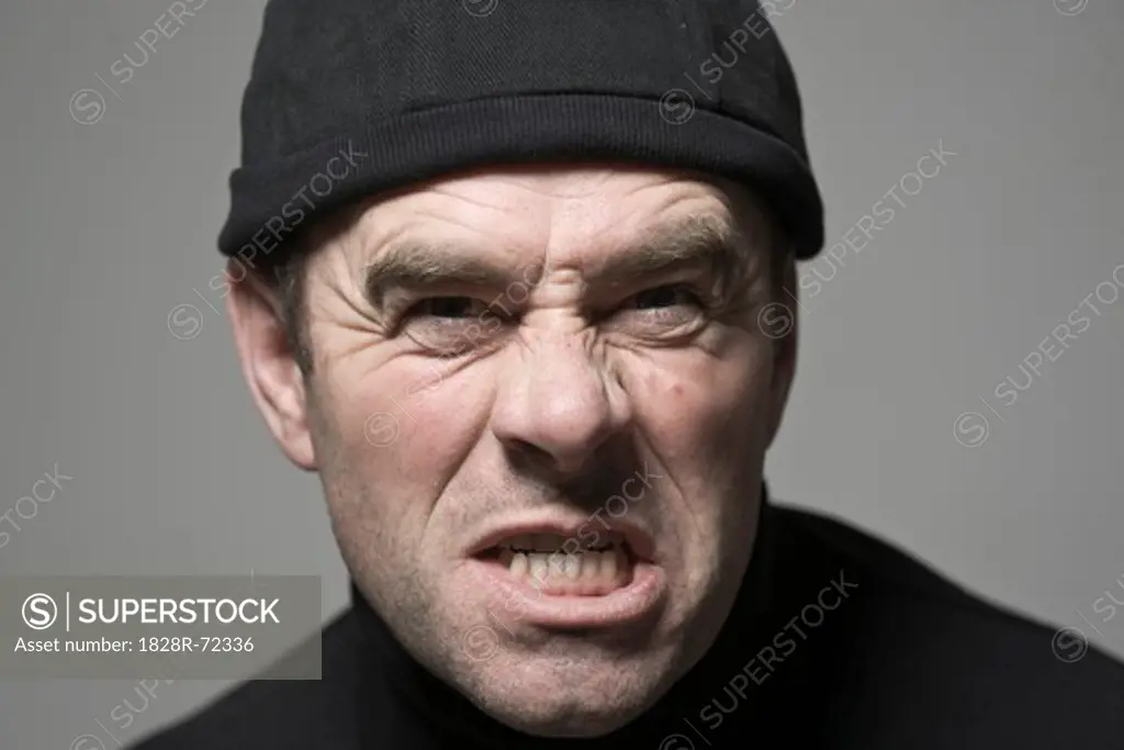 Portrait of Man in Black Cap