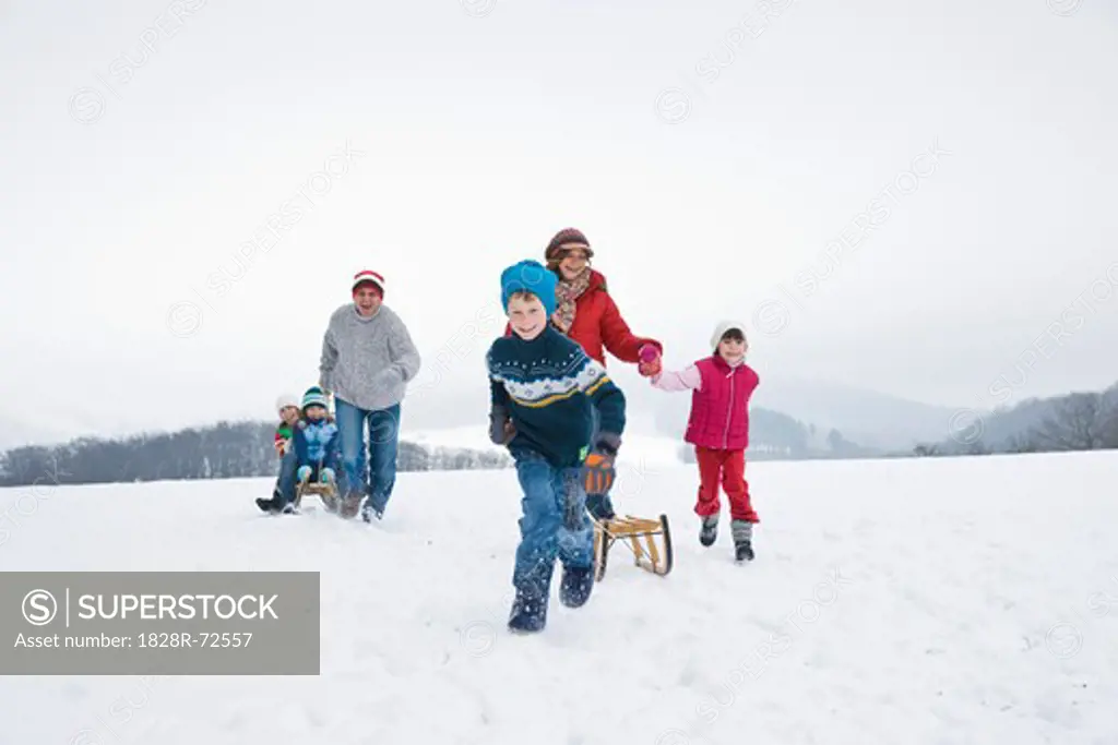 Family having Fun Outdoors in Winter