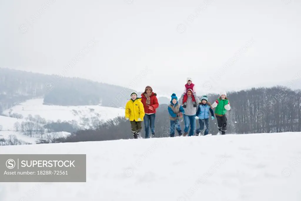 Family Walking in the Snow