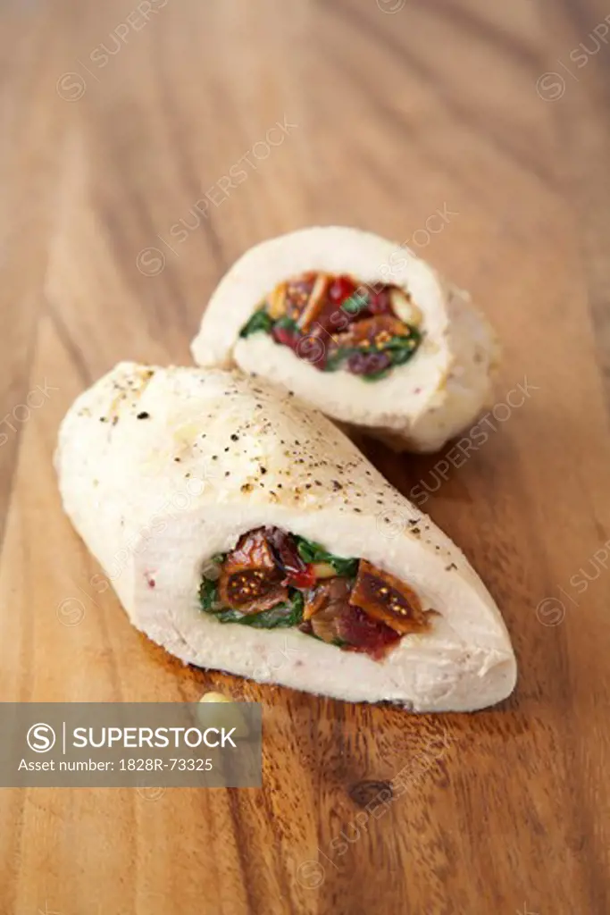 Rolled Chicken Breast Stuffed with Figs, Spinach, Pine Nuts and Cranberries