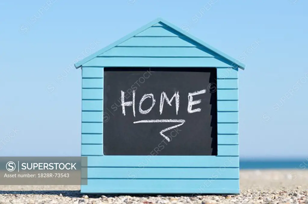 Home Written on House Shaped Chalkboard