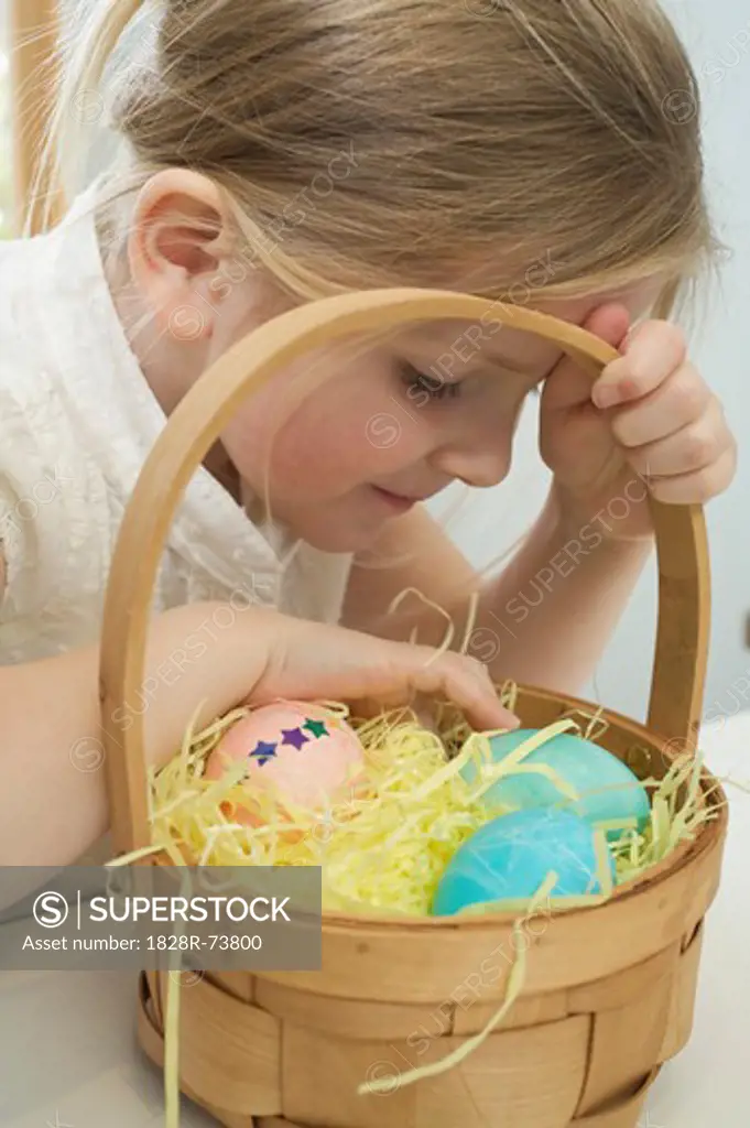 Little Girl With Basket of Easter Eggs