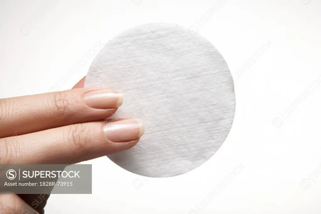 Close-up of Woman Holding Cotton Pad