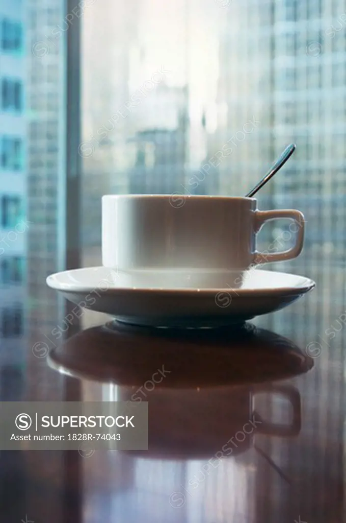 Cup of Coffee on Boardroom Table
