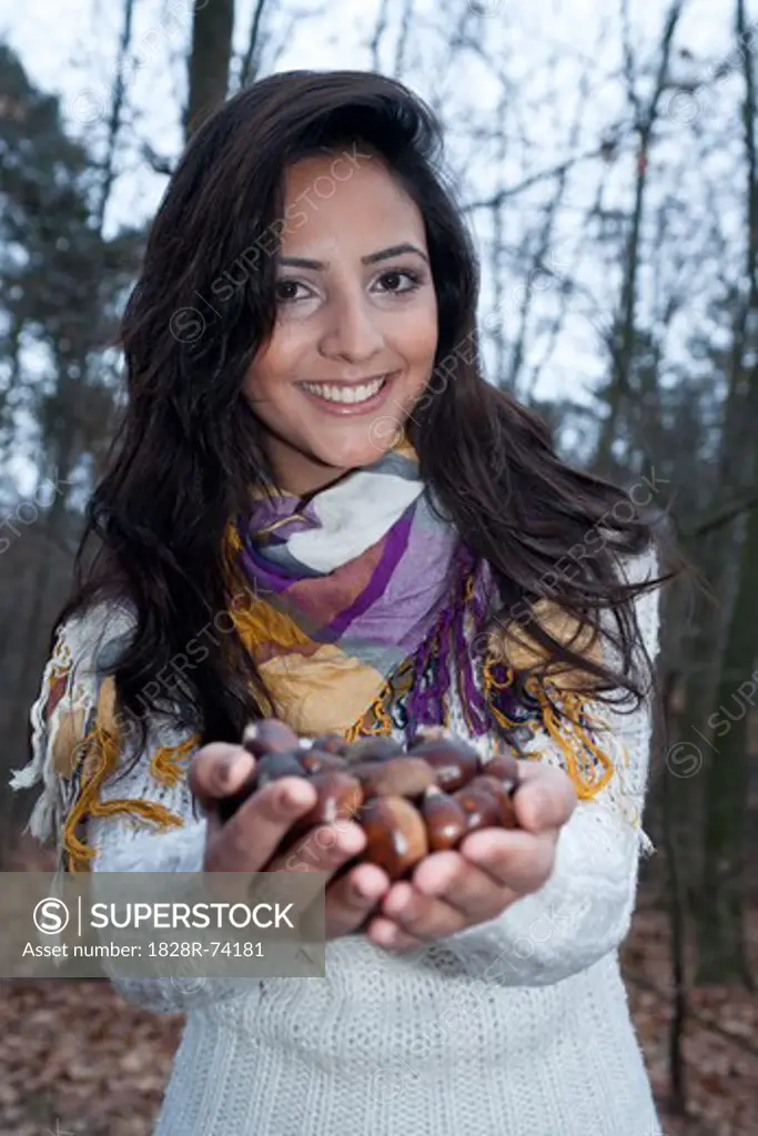 Woman With a Handful of Chestnuts