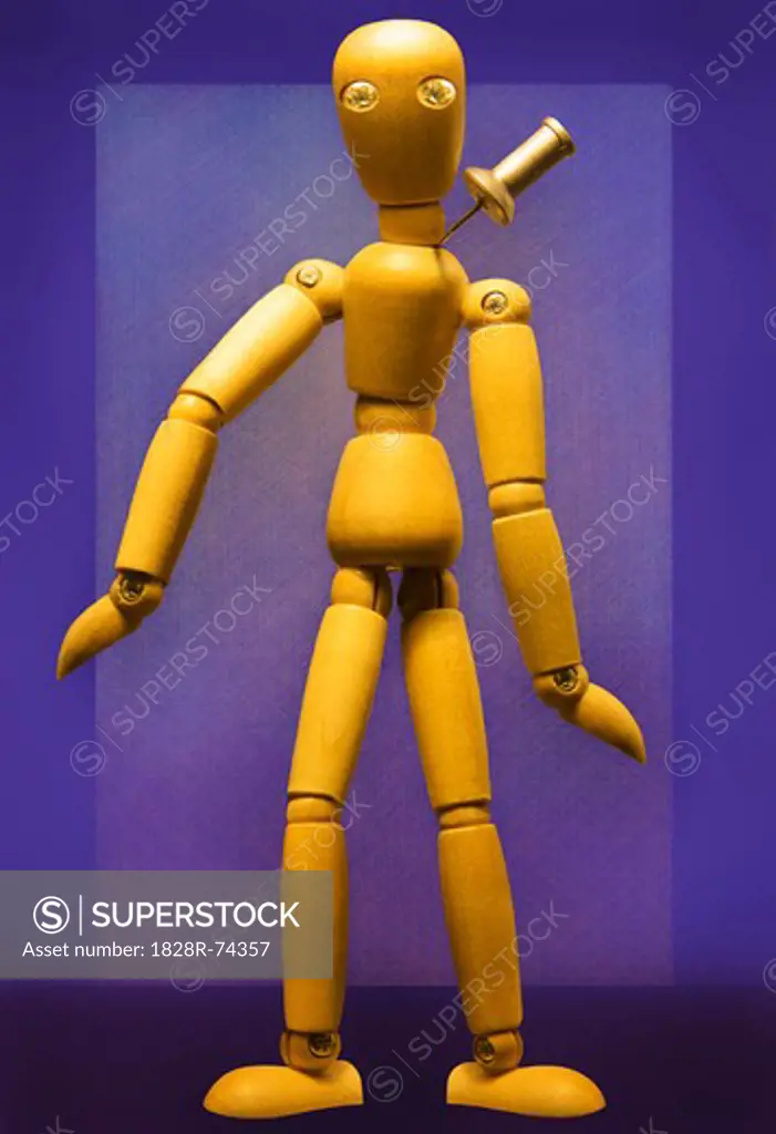 Wooden Figure with Pushpin in Neck