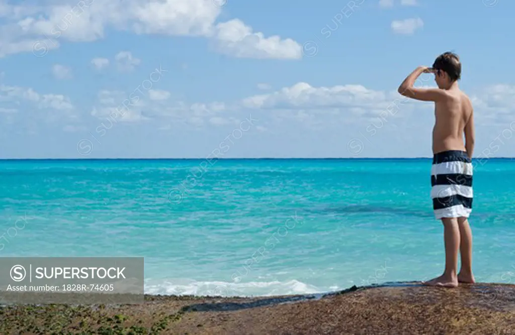 Boy Looking at Caribbean Sea