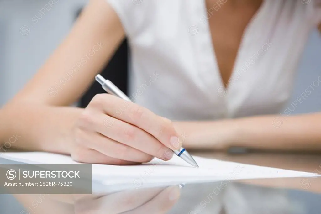 Close-up of Businesswoman Writing