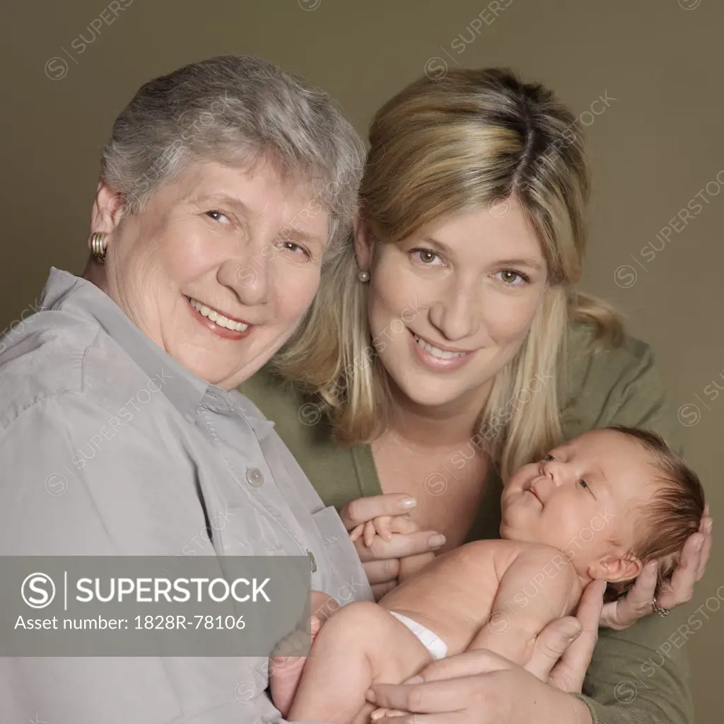Portrait of Mother and Grandmother With Newborn Baby