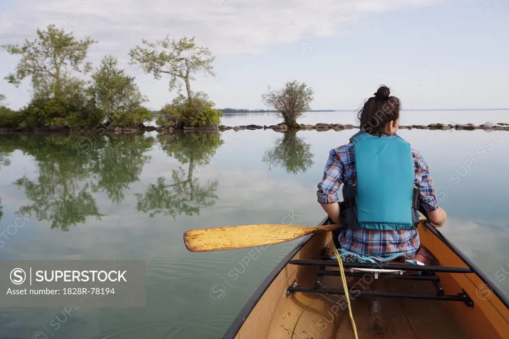 Woman Canoeing, Clearwater Lake, Clearwater Lake Provincial Park, Manitoba, Canada