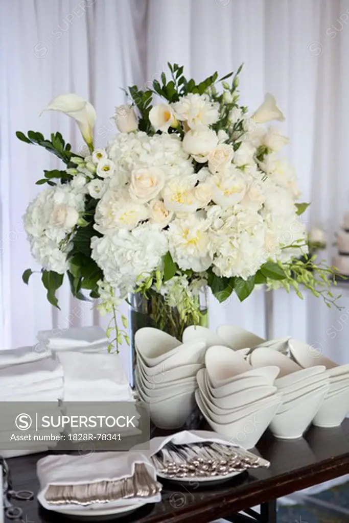 Utensils, Dishes and Flowers at Wedding Reception