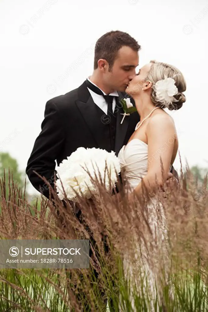 Portrait of Bride and Groom Kissing, Eagles Nest Golf Club, Vaughan, Ontario, Canada