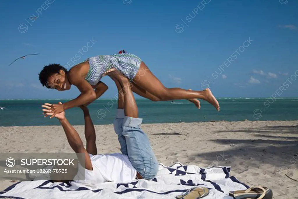 Couple Playing on the Beach, Florida, USA