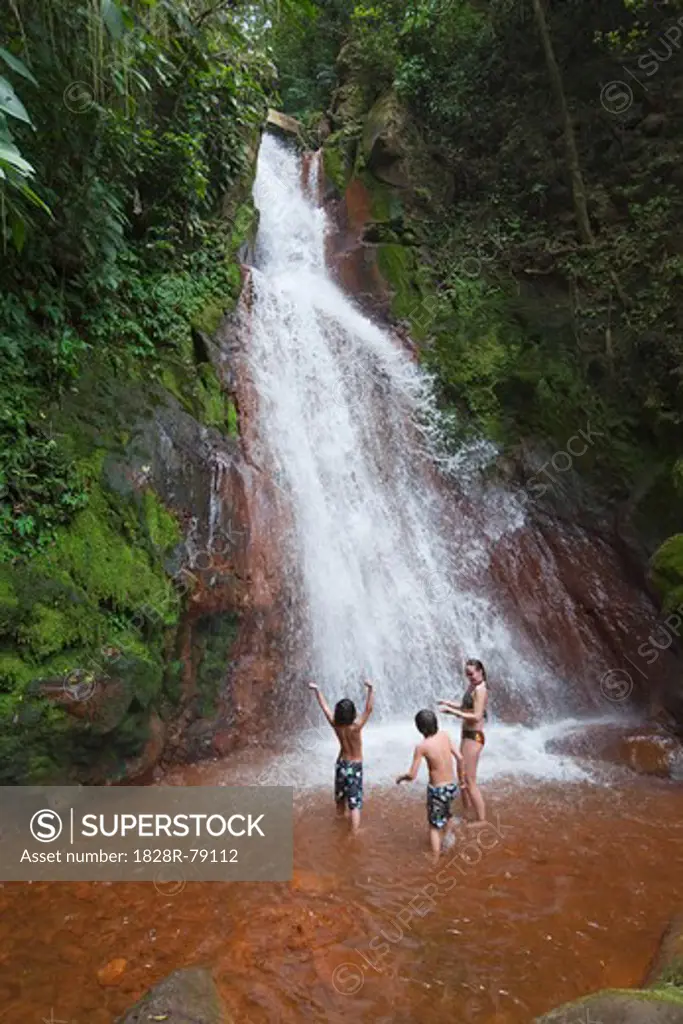 Mother and Boys Playing in Waterfall, Miravalles, Cordillera de Guanacaste, Guanacaste, Costa Rica