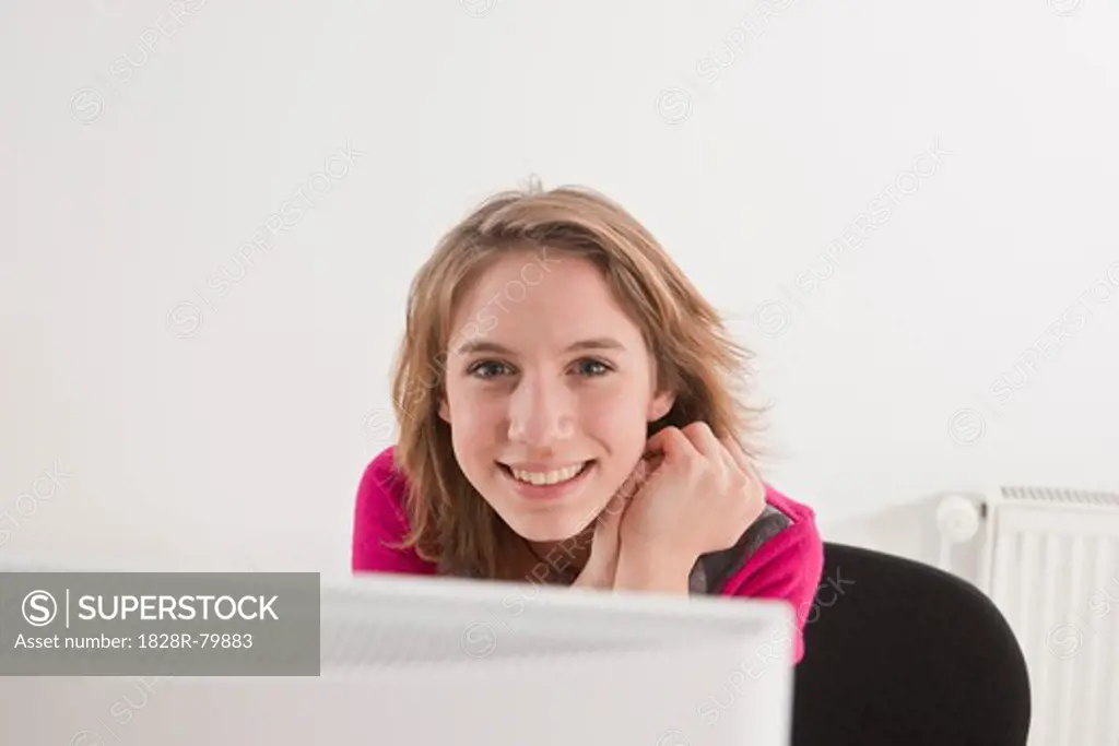 Teenager using Computer