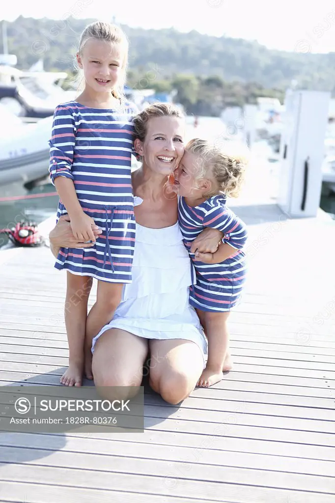 Mother and Daughters on Dock at Marina