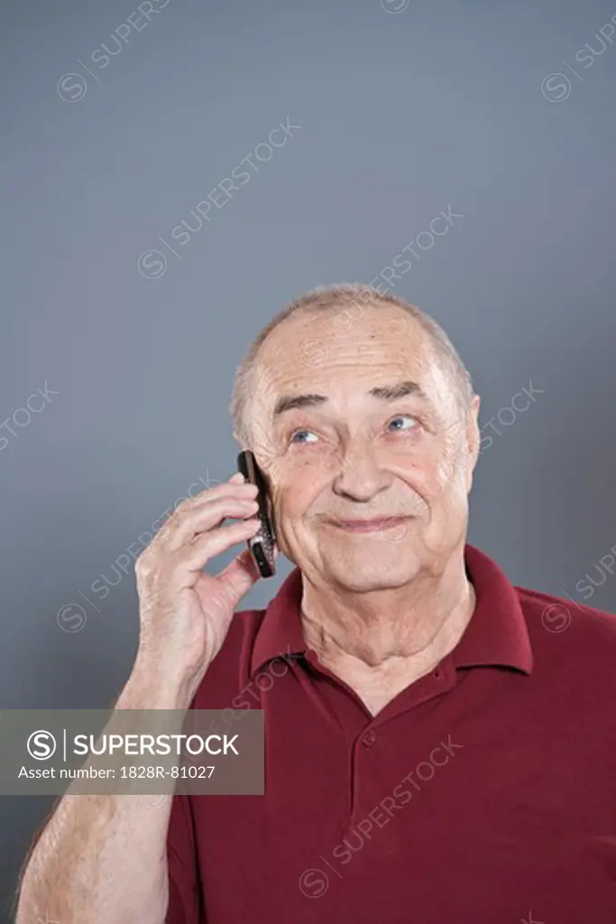 Man Using Cellular Telephone