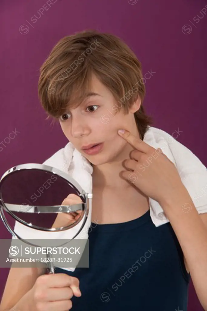 Boy Looking in Mirror