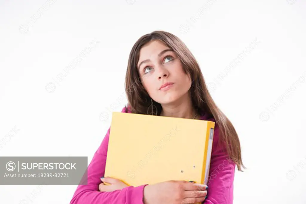 Portrait of Girl Holding School Books