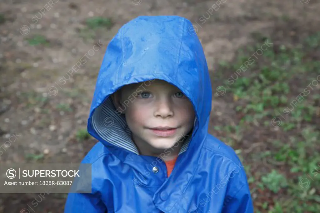 Portrait of Boy in Blue Rain Jacket, Camping at Stephen F. Austin Park, Sealy, Texas, USA