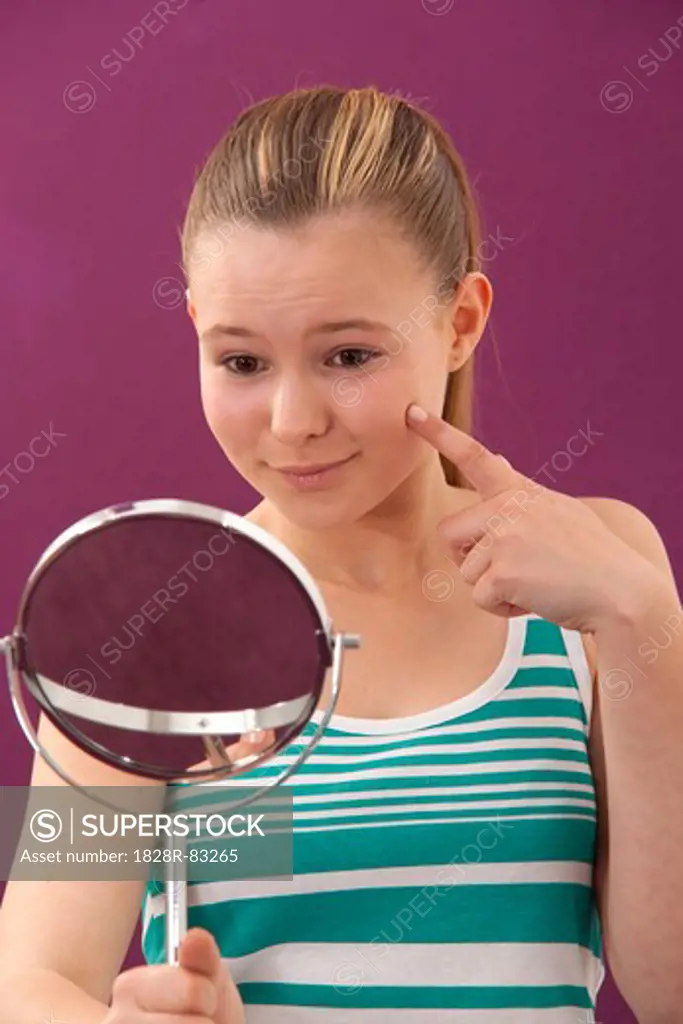 Girl Looking in Mirror