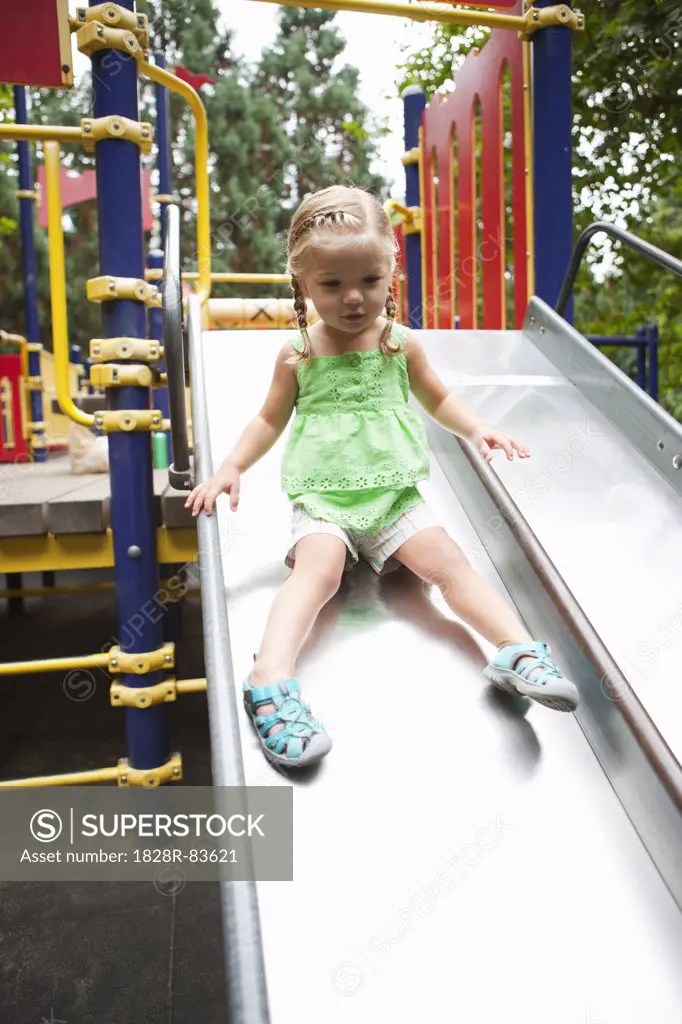 Girl Playing on Slide, Washington Park Playground, Portland, Oregon, USA