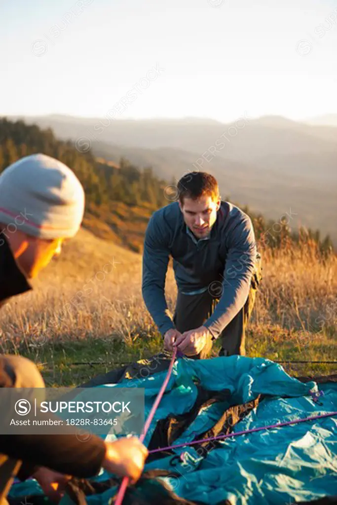 Men Setting Up Tent, Hood River, Oregon, USA