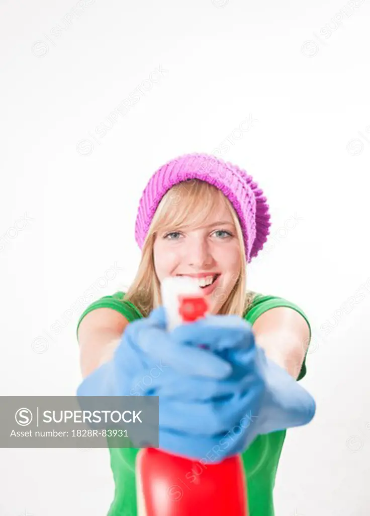 Portrait of Girl Holding Cleaning Supplies