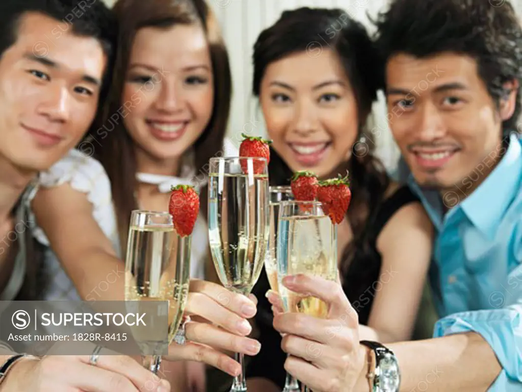 Portrait of Group with Champagne And Strawberries   