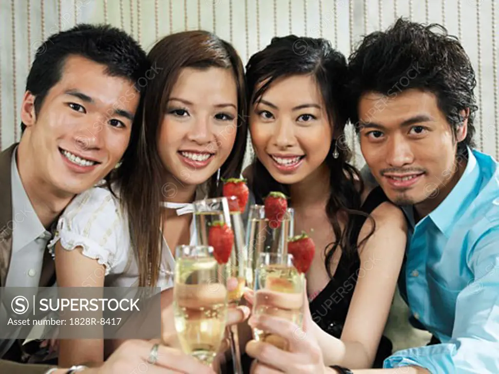 Portrait of Group with Champagne And Strawberries   