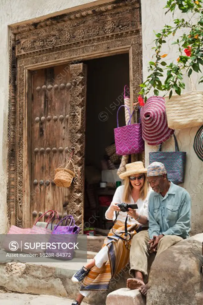 Basket Seller with Tourist, Stone Town, Unguja, Zanzibar, Tanzania
