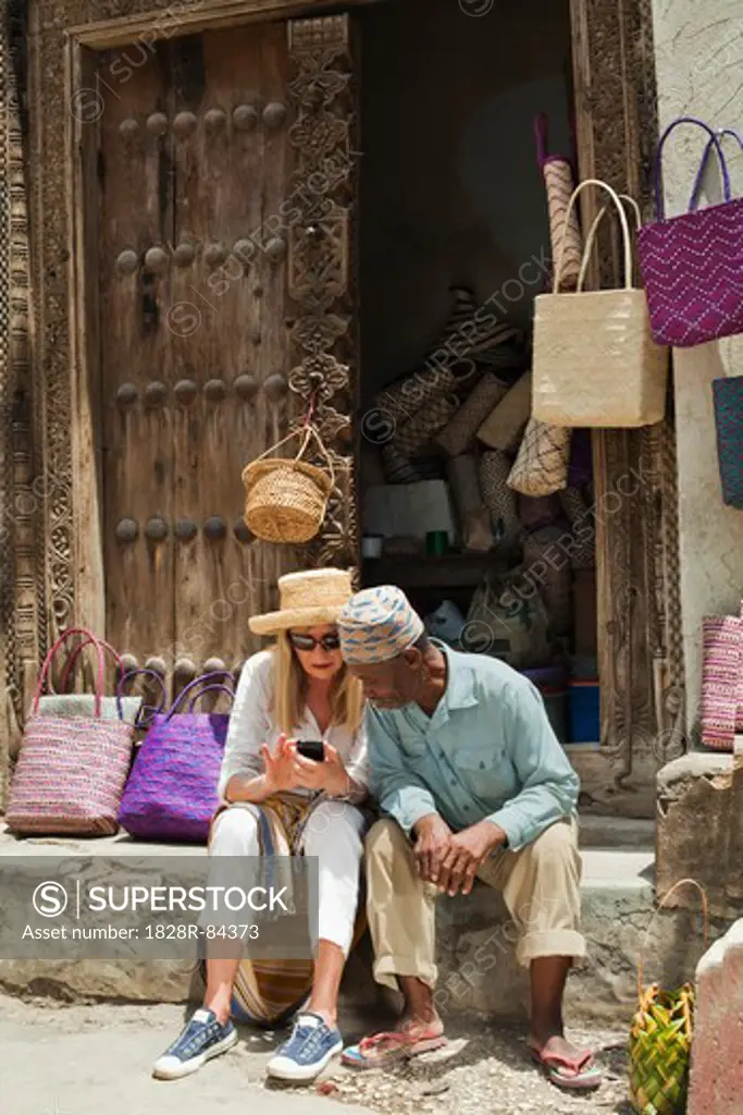 Basket Seller with Tourist, Stone Town, Unguja, Zanzibar, Tanzania