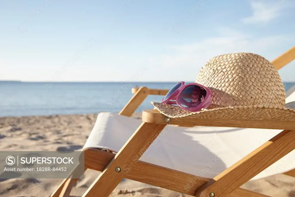 Sunhat and Sunglasses on Chair at Beach, Boltenhagen, Baltic Sea, Germany