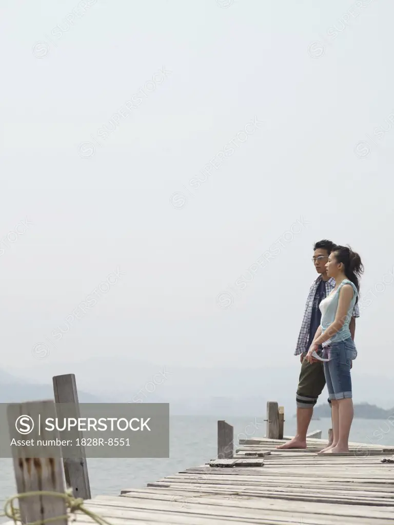 Couple Standing on Dock   