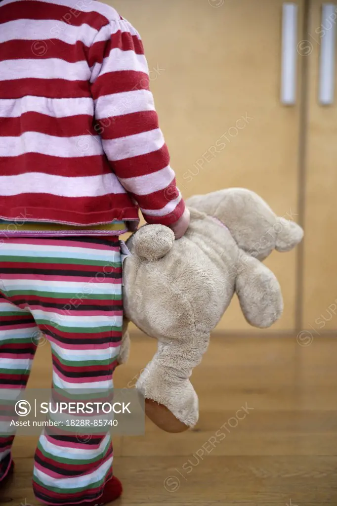 Baby Girl Holding Teddy Bear, London, England