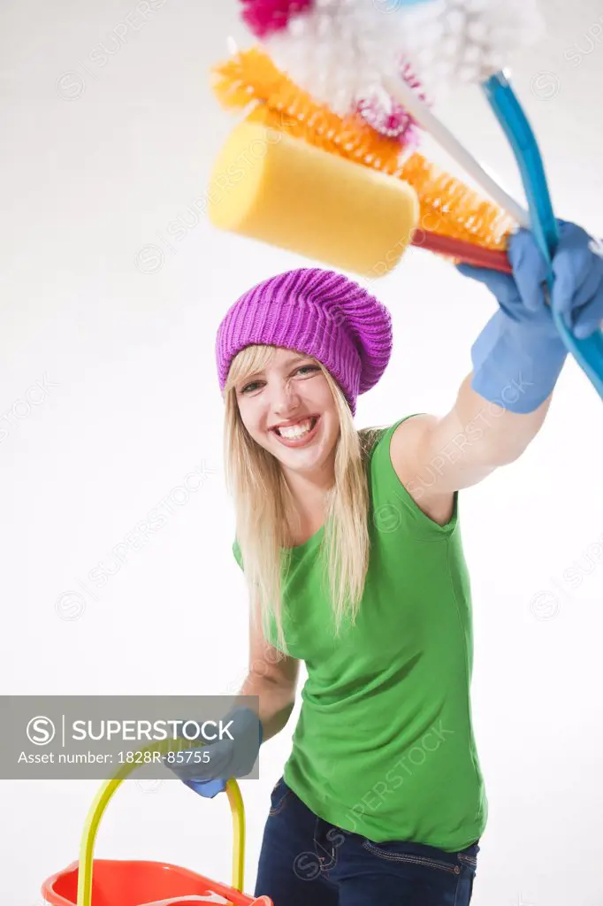 Teenage Girl With Cleaning Supplies