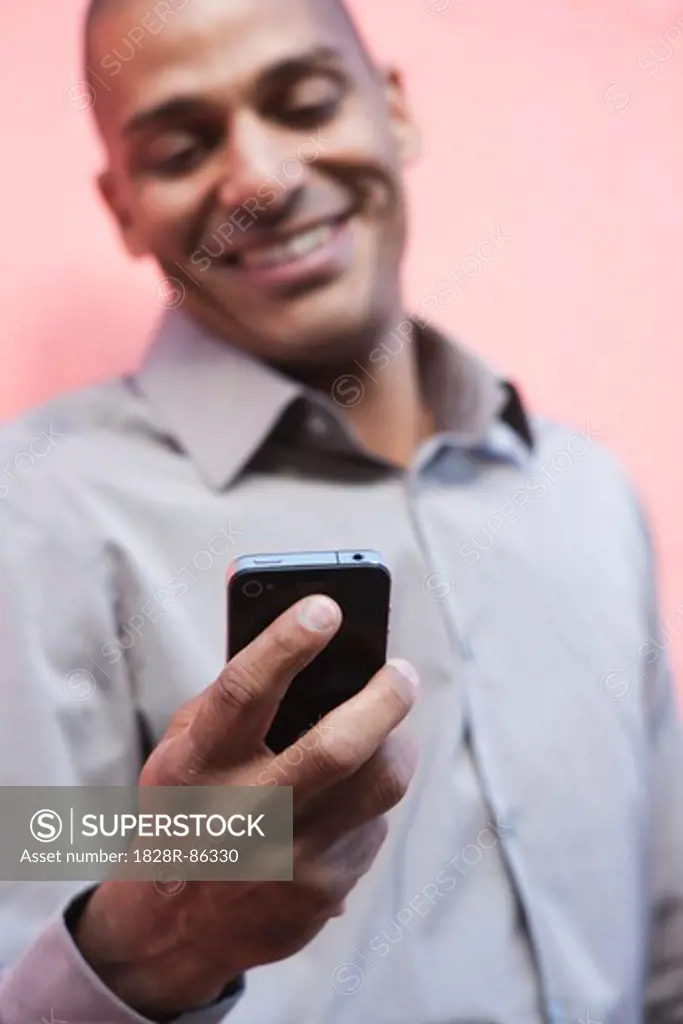 Man Looking at Cellphone